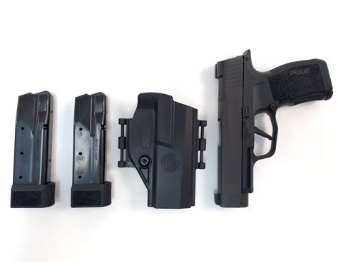 7" OVERALL LENGTH: 6. . Sig sauer p365xl tacpac 9mm pistol with holster and 3 magazines black
